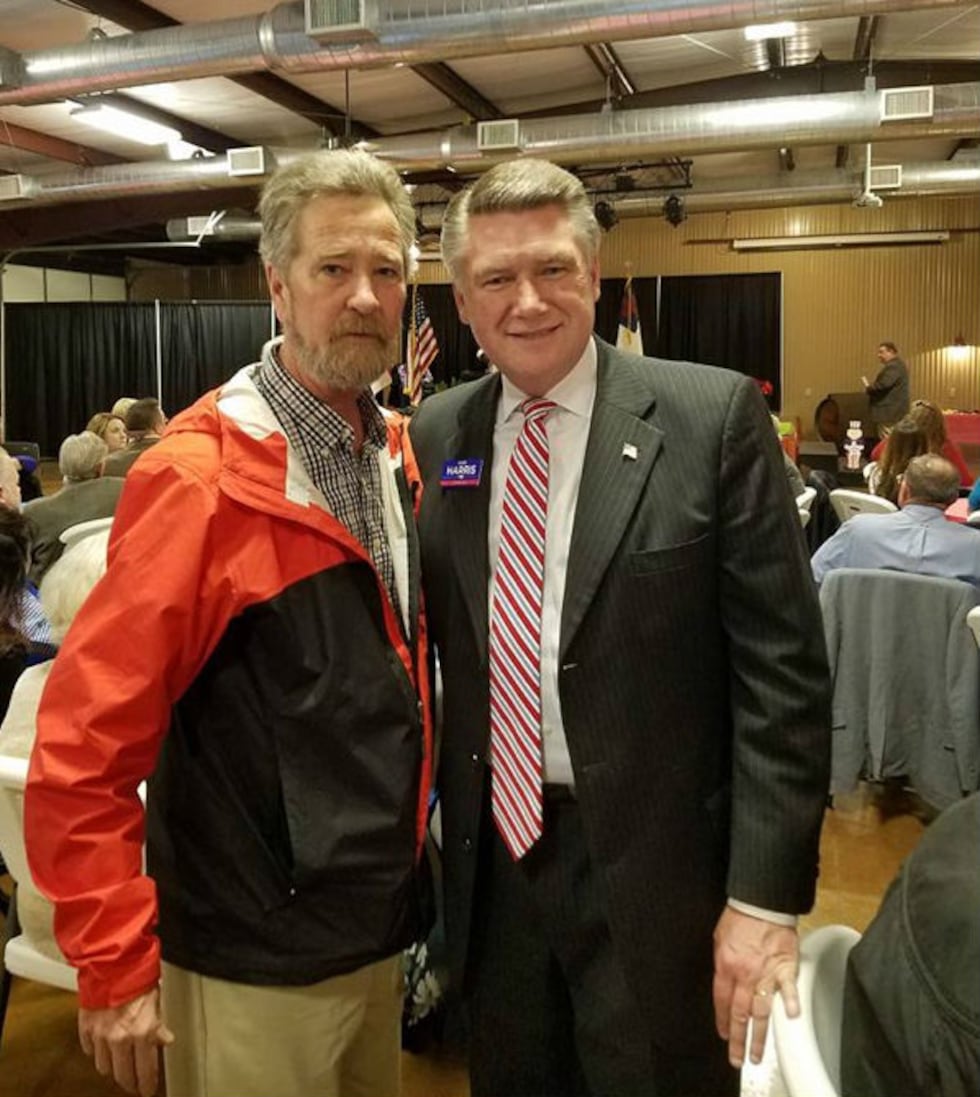 McCrae Dowless, left, and Mark Harris are pictured together at a dinner in Bladen County in...