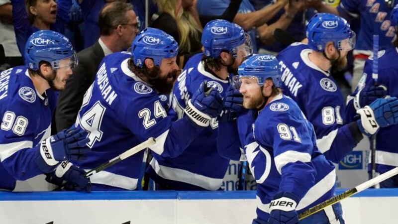 Tampa Bay Lightning center Steven Stamkos (91) celebrates with the bench after his goal...