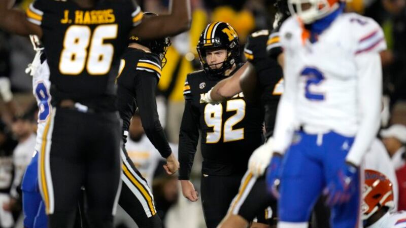 Missouri place-kicker Harrison Mevis (92) celebrates after making a 30-yard field goal late in...