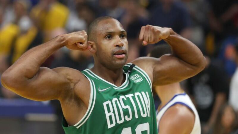 Boston Celtics center Al Horford (42) celebrates during the second half of Game 1 of...