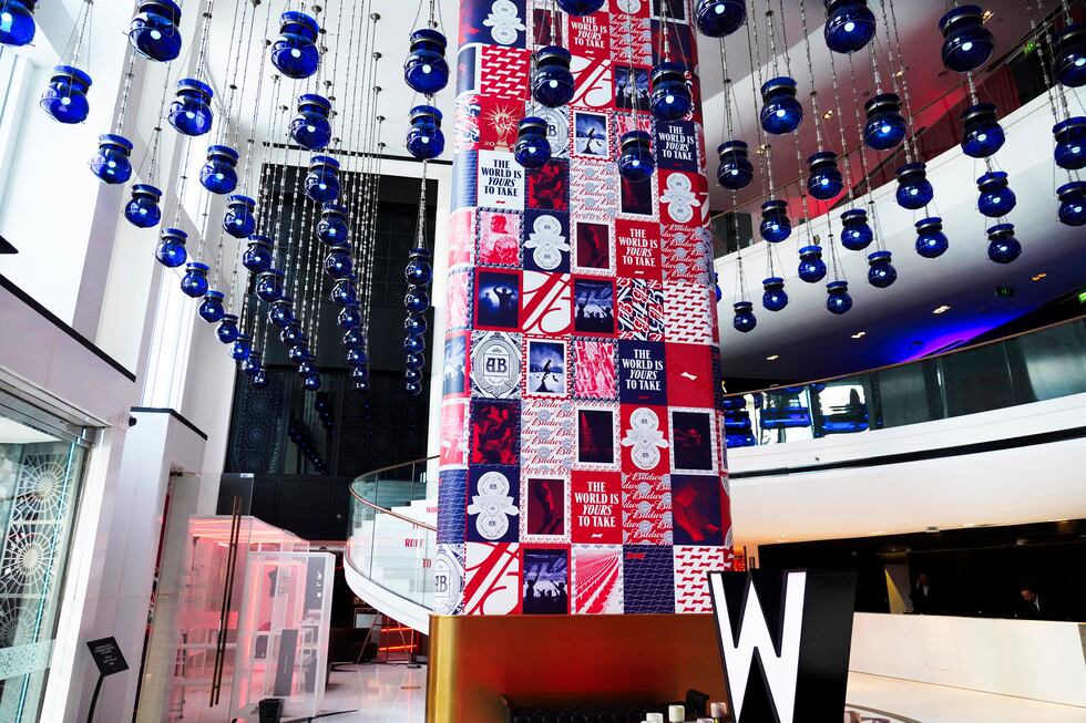 Ads for Budweiser are seen at a hotel hosting a major bar for the beermaker in Doha, Qatar,...