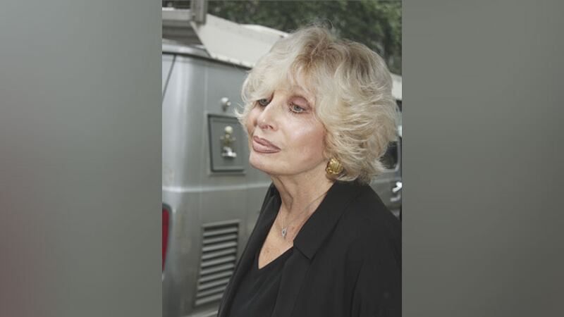 FILE - American mezzo-soprano Joanna Simon leaves St. Bartholomew's Church in New York,...