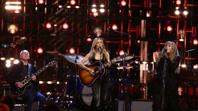 Peter Frampton, from left, Sheryl Crow, and Stevie Nicks perform during the Rock & Roll Hall...
