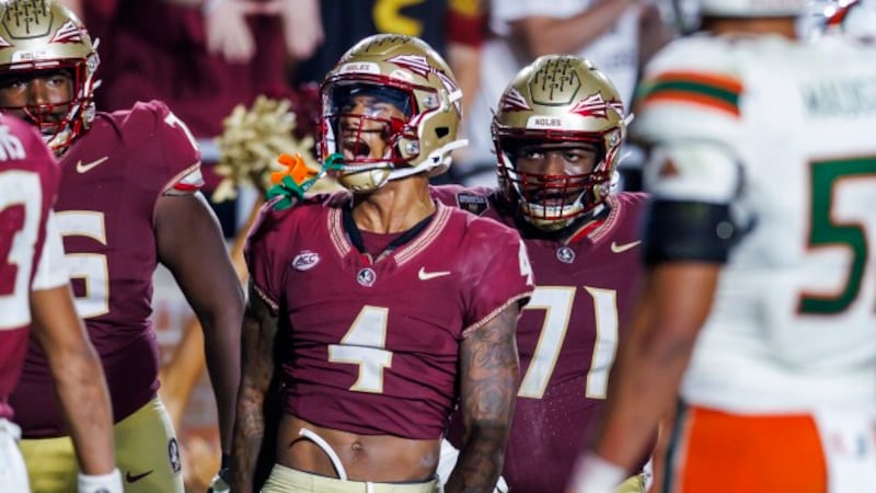 Florida State's Keon Coleman (4) celebrates after making the team's final touchdown against...