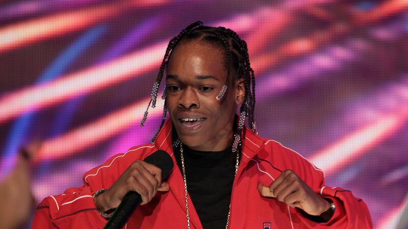 Rapper Hurricane Chris, born Christopher Dooley Jr., performs during a taping of BET's "106...