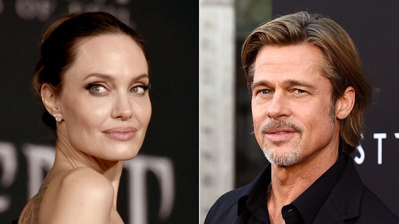 FILE - This combination photo shows Angelina Jolie at a premiere in Los Angeles on Sept. 30,...