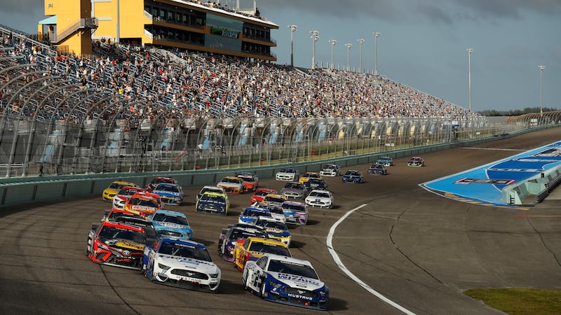 HOMESTEAD, FLORIDA - FEBRUARY 28: Brad Keselowski, driver of the #2 Dent Wizard Ford, and...