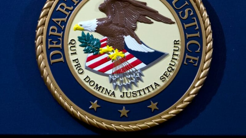 FILE - In this Nov. 28, 2018, file photo, the Department of Justice seal is seen in...