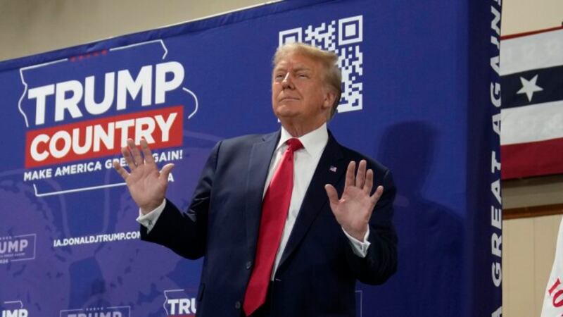 Former President Donald Trump arrives for a commit to caucus rally, Wednesday, Sept. 20, 2023,...