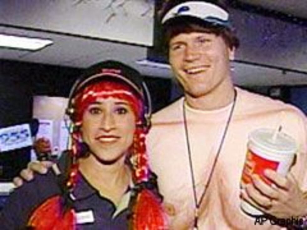 Jon Kitna and his wife dressed up as a naked man and a fast-food drive-through attendant.